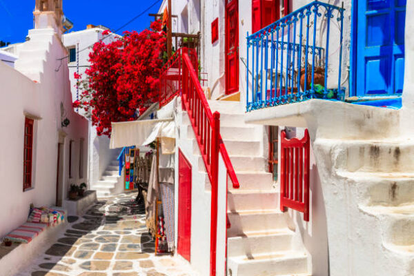 Santorini Authentic traditional Greece. Charming colorful floral streets of Mykonos island. Cyclades